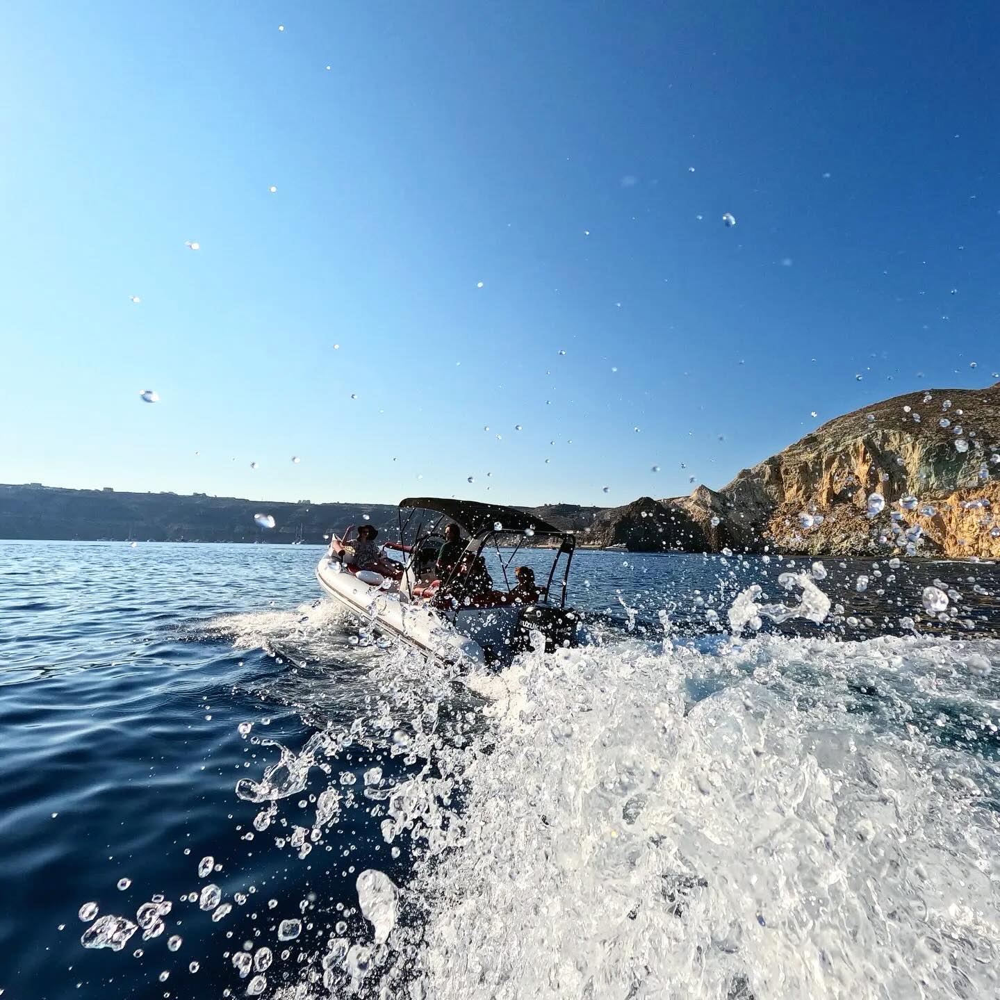 A photo of a boat making waves