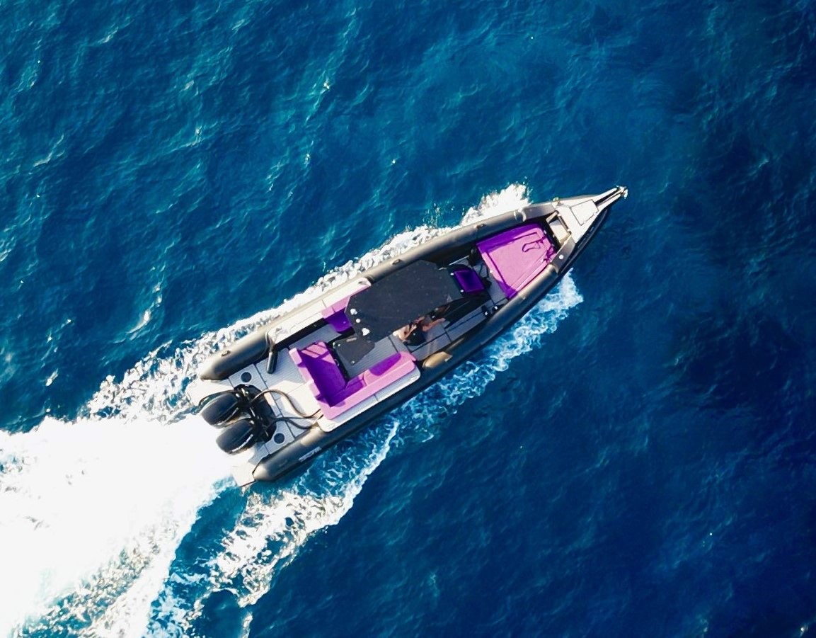 Nephele boat on blue water
