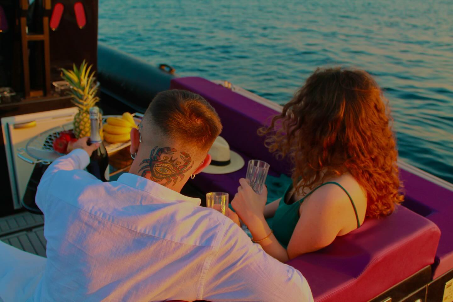 two guests enjoying food on boat Nephele